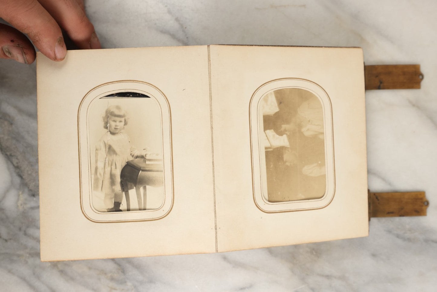 Lot 144 - Antique Photo Album With Gold Lettering On Spine, Gold On Cover, Containing Four Tintypes, 10 Carte De Visite, And 25 Snapshot Photos Of The Patterson Family, 19th / Early 20th Century, Including C.D.V. Of Little Girl Playing Piano (All Pages Included In Pictures)