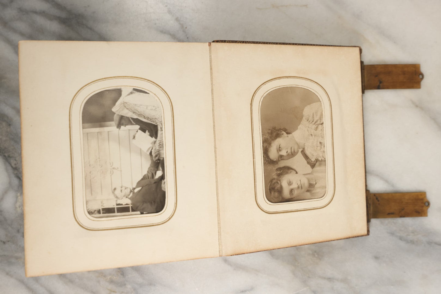Lot 144 - Antique Photo Album With Gold Lettering On Spine, Gold On Cover, Containing Four Tintypes, 10 Carte De Visite, And 25 Snapshot Photos Of The Patterson Family, 19th / Early 20th Century, Including C.D.V. Of Little Girl Playing Piano (All Pages Included In Pictures)