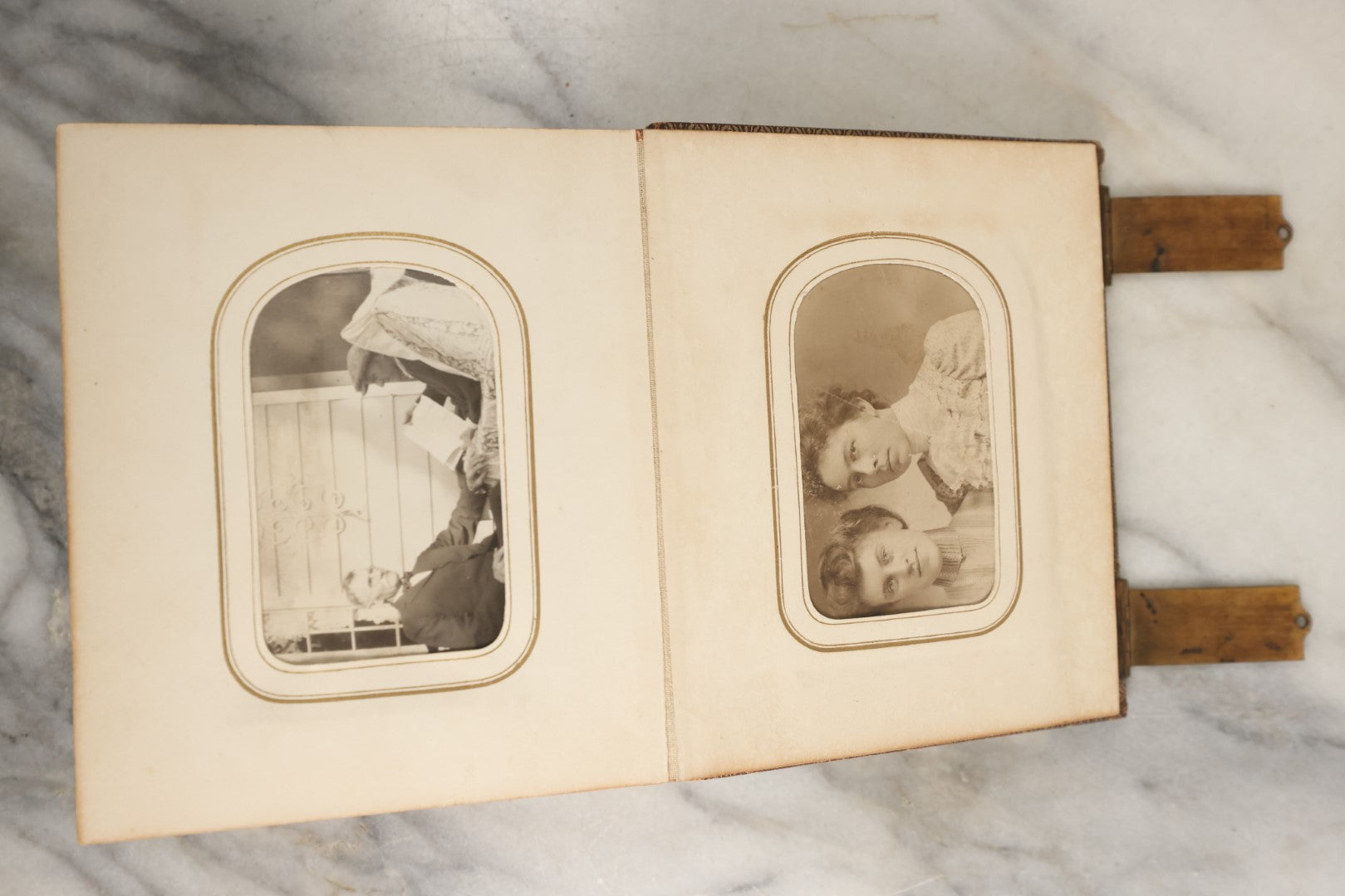 Lot 144 - Antique Photo Album With Gold Lettering On Spine, Gold On Cover, Containing Four Tintypes, 10 Carte De Visite, And 25 Snapshot Photos Of The Patterson Family, 19th / Early 20th Century, Including C.D.V. Of Little Girl Playing Piano (All Pages Included In Pictures)