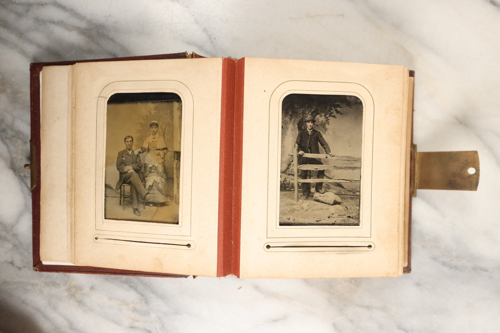Lot 145 - Antique Photo Album With Gold Lettering On Spine, Plain Cover, Containing 27 Tintypes, 3 Snapshots, And 3 Religious Filler Cards (All Pages Included In Pictures)