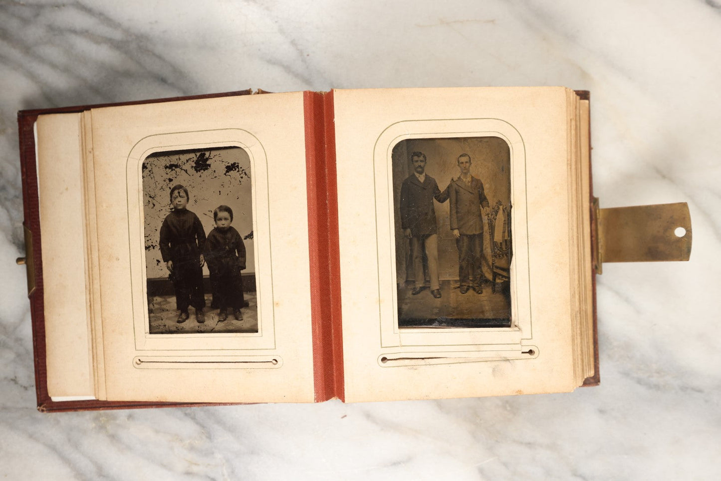 Lot 145 - Antique Photo Album With Gold Lettering On Spine, Plain Cover, Containing 27 Tintypes, 3 Snapshots, And 3 Religious Filler Cards (All Pages Included In Pictures)