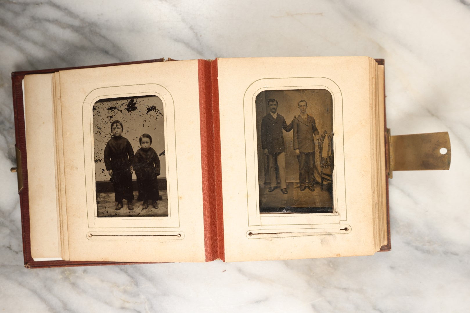Lot 145 - Antique Photo Album With Gold Lettering On Spine, Plain Cover, Containing 27 Tintypes, 3 Snapshots, And 3 Religious Filler Cards (All Pages Included In Pictures)