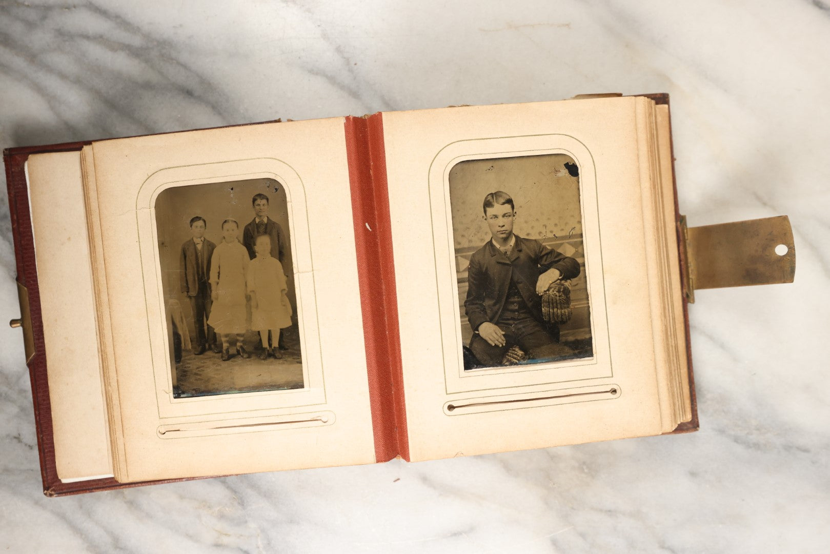 Lot 145 - Antique Photo Album With Gold Lettering On Spine, Plain Cover, Containing 27 Tintypes, 3 Snapshots, And 3 Religious Filler Cards (All Pages Included In Pictures)