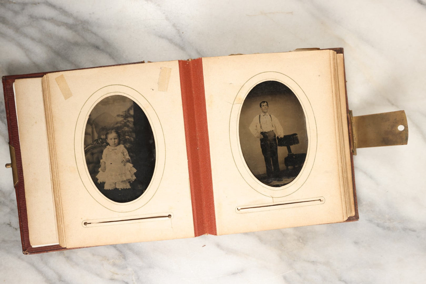 Lot 145 - Antique Photo Album With Gold Lettering On Spine, Plain Cover, Containing 27 Tintypes, 3 Snapshots, And 3 Religious Filler Cards (All Pages Included In Pictures)