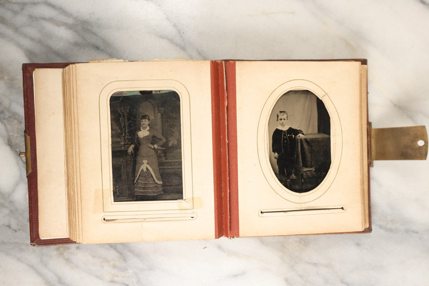 Lot 145 - Antique Photo Album With Gold Lettering On Spine, Plain Cover, Containing 27 Tintypes, 3 Snapshots, And 3 Religious Filler Cards (All Pages Included In Pictures)