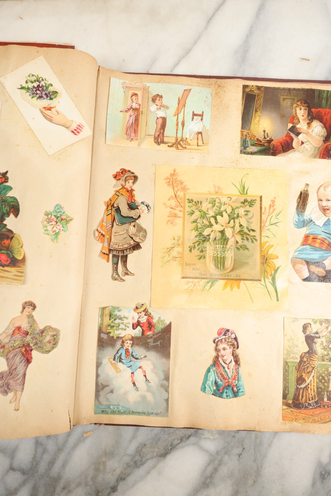 Lot 155 - Antique Victorian Scrapbook Album With Woman On Cover Containing 175+ Pieces Including Die Cuts, Trade Cards, Calling Cards, And More, With Woman On Cover, Note Cover Detached