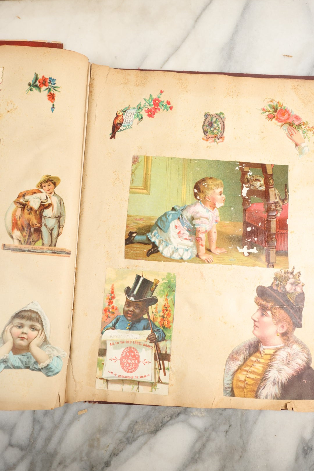 Lot 155 - Antique Victorian Scrapbook Album With Woman On Cover Containing 175+ Pieces Including Die Cuts, Trade Cards, Calling Cards, And More, With Woman On Cover, Note Cover Detached