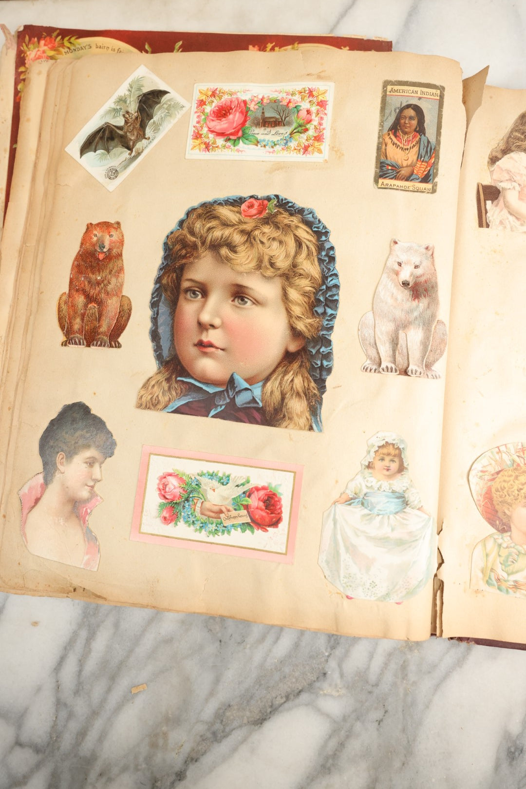 Lot 155 - Antique Victorian Scrapbook Album With Woman On Cover Containing 175+ Pieces Including Die Cuts, Trade Cards, Calling Cards, And More, With Woman On Cover, Note Cover Detached