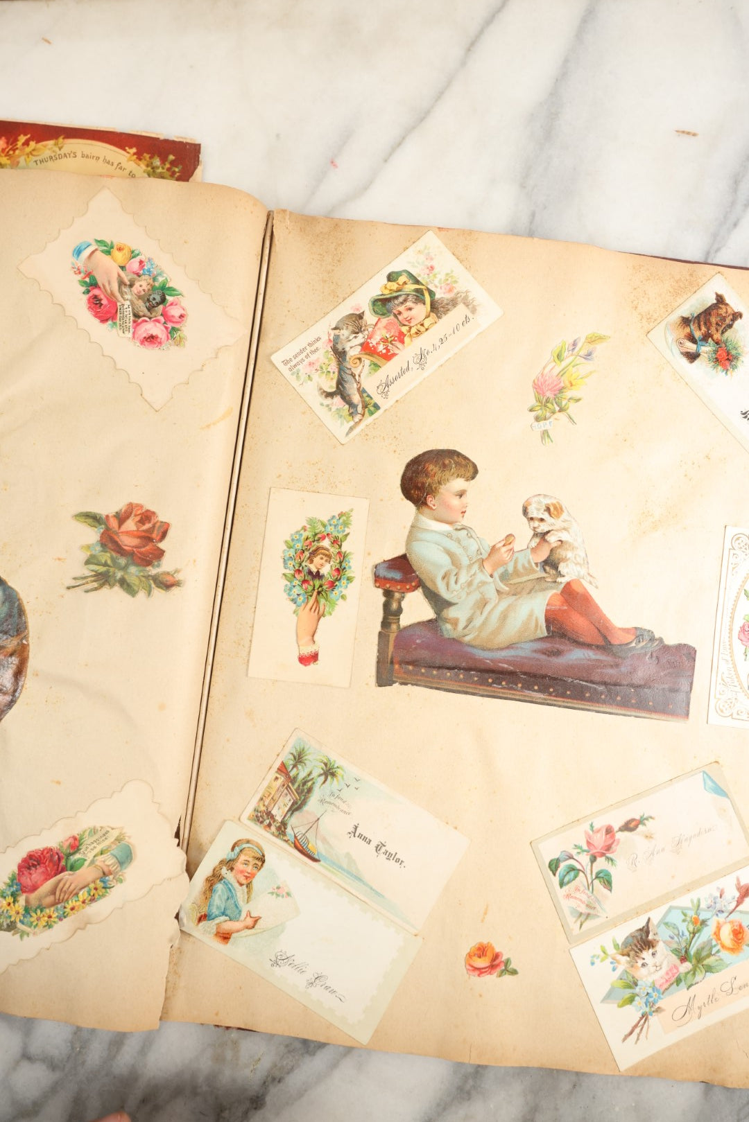 Lot 155 - Antique Victorian Scrapbook Album With Woman On Cover Containing 175+ Pieces Including Die Cuts, Trade Cards, Calling Cards, And More, With Woman On Cover, Note Cover Detached