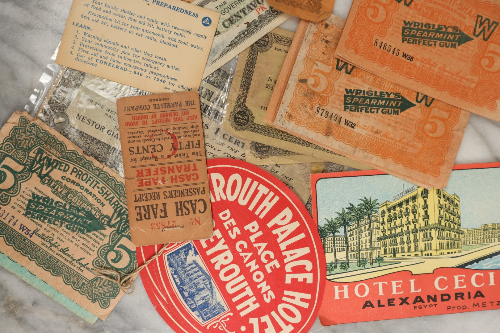 Lot 162 - Grouping Of 10+ Pieces Of Miscellaneous Advertising Including Wrigley's Spearmint Gum Coupons, Hotel Labels, Civil Defence Emergency Card, And More