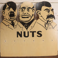 Lot 012 - Vintage World War II Era Die Cut Store Counter Display Mocking Hitler, Mussolini, And Stalin, Titled "Nuts," Manufactured By Oliver Chadwick, 1940, 22-1/4" x 22"