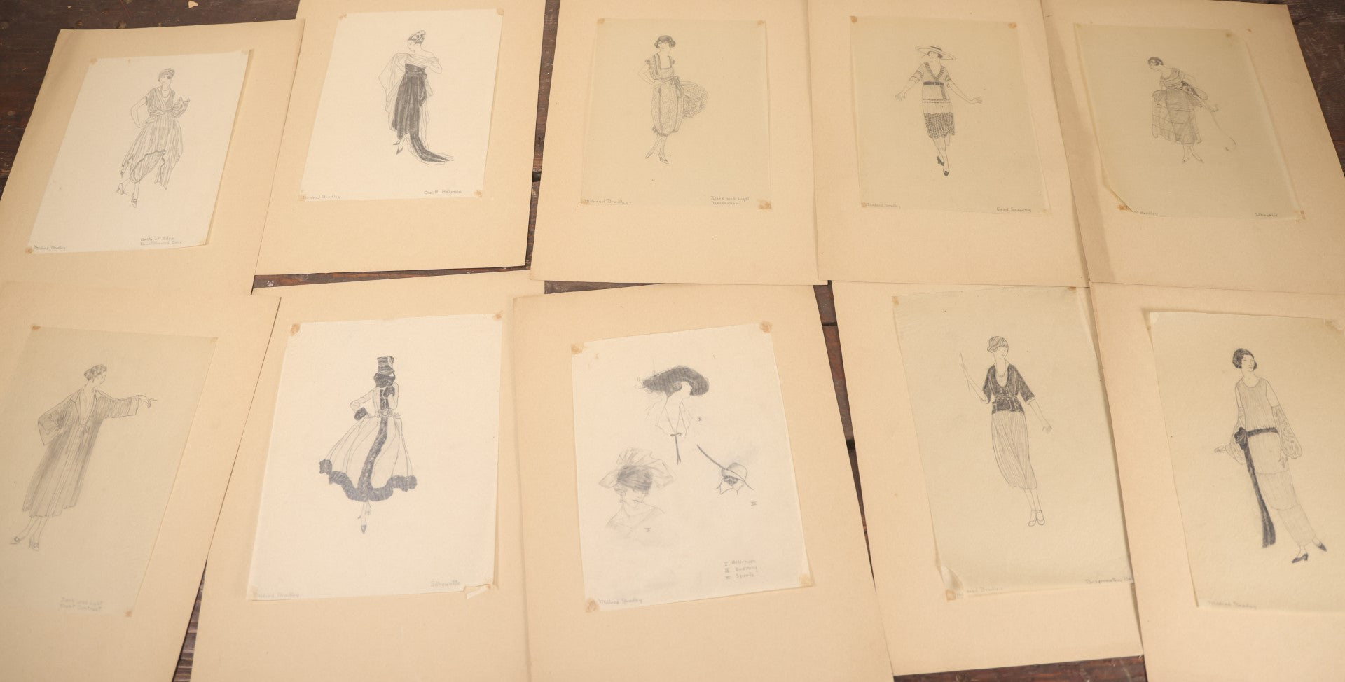 Lot 013 - Grouping Of 10 Antique Hand Drawn Pencil Sketches Of Women's Fashion, Likely Student Works, Signed Mildred Bradley