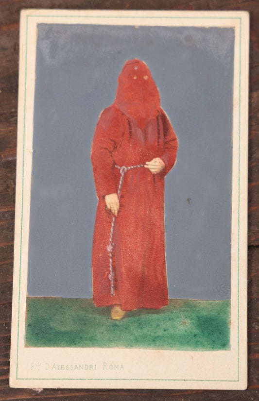 Lot 040 - Antique Hand Colored Carte De Visite C.D.V. Photograph Of An Italian Priest Of The Confraternity Of The Penitents (Penitents Rouges Or Red Penitents), Catholic Religious Order, Fratelli D'Alessandri Photographer