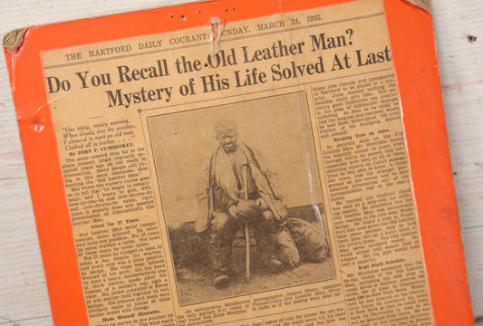 Lot 044 - Vintage Newspaper Clipping Mounted On Board Regarding The Mystery Of The Old Leather Man, Northeastern Vagabond Folk Figure, Hartford Daily Courant, March 25, 1935