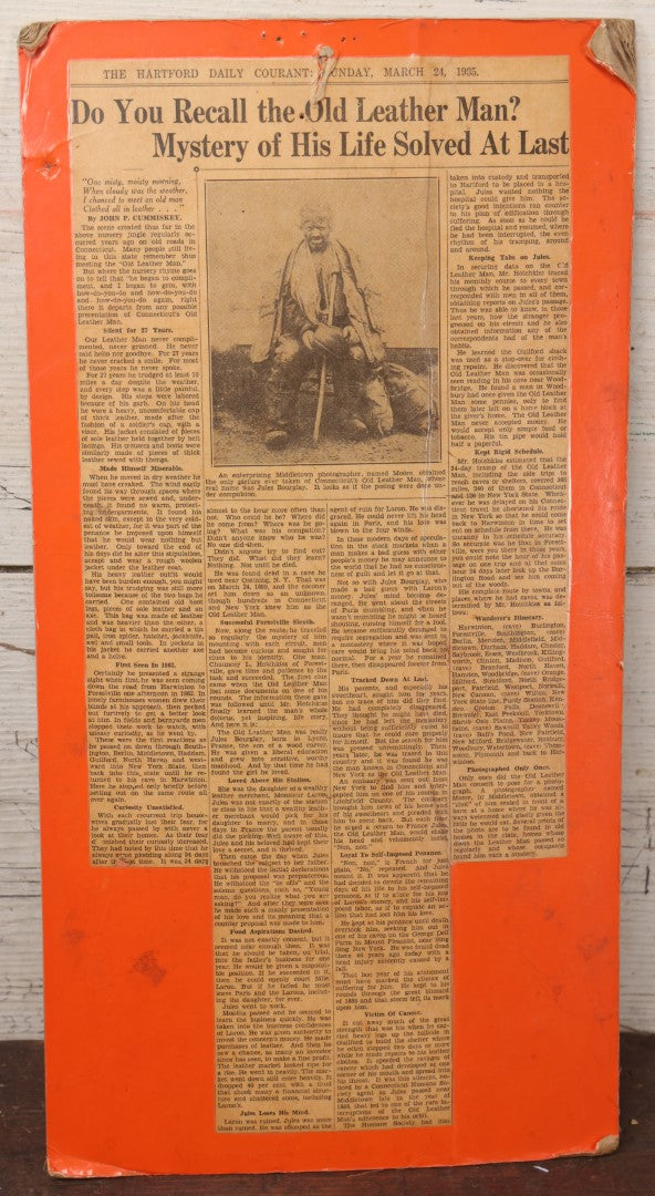 Lot 044 - Vintage Newspaper Clipping Mounted On Board Regarding The Mystery Of The Old Leather Man, Northeastern Vagabond Folk Figure, Hartford Daily Courant, March 25, 1935