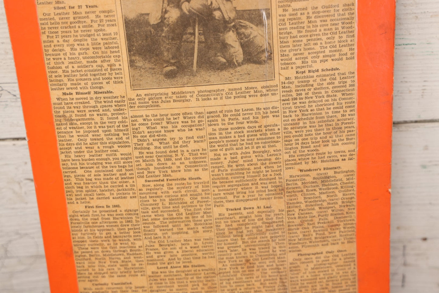 Lot 044 - Vintage Newspaper Clipping Mounted On Board Regarding The Mystery Of The Old Leather Man, Northeastern Vagabond Folk Figure, Hartford Daily Courant, March 25, 1935