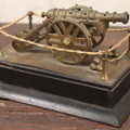 Lot 047 - Vintage Brass Metal Canon Miniature Display On Wooden Base With Rope Surround