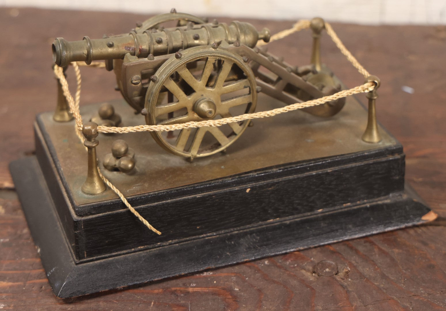 Lot 047 - Vintage Brass Metal Canon Miniature Display On Wooden Base With Rope Surround