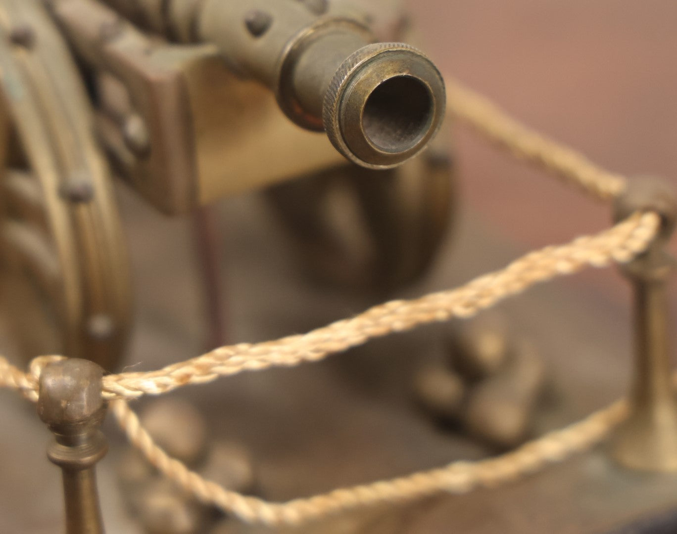 Lot 047 - Vintage Brass Metal Canon Miniature Display On Wooden Base With Rope Surround