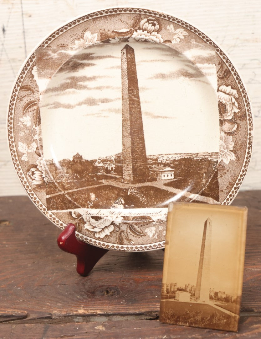 Lot 048 - Pair Of Antique Bunker Hill Monument, Boston, Massachusetts Souvenir Collectibles, Including Transferware Plate And Photograph Mounted To Frame