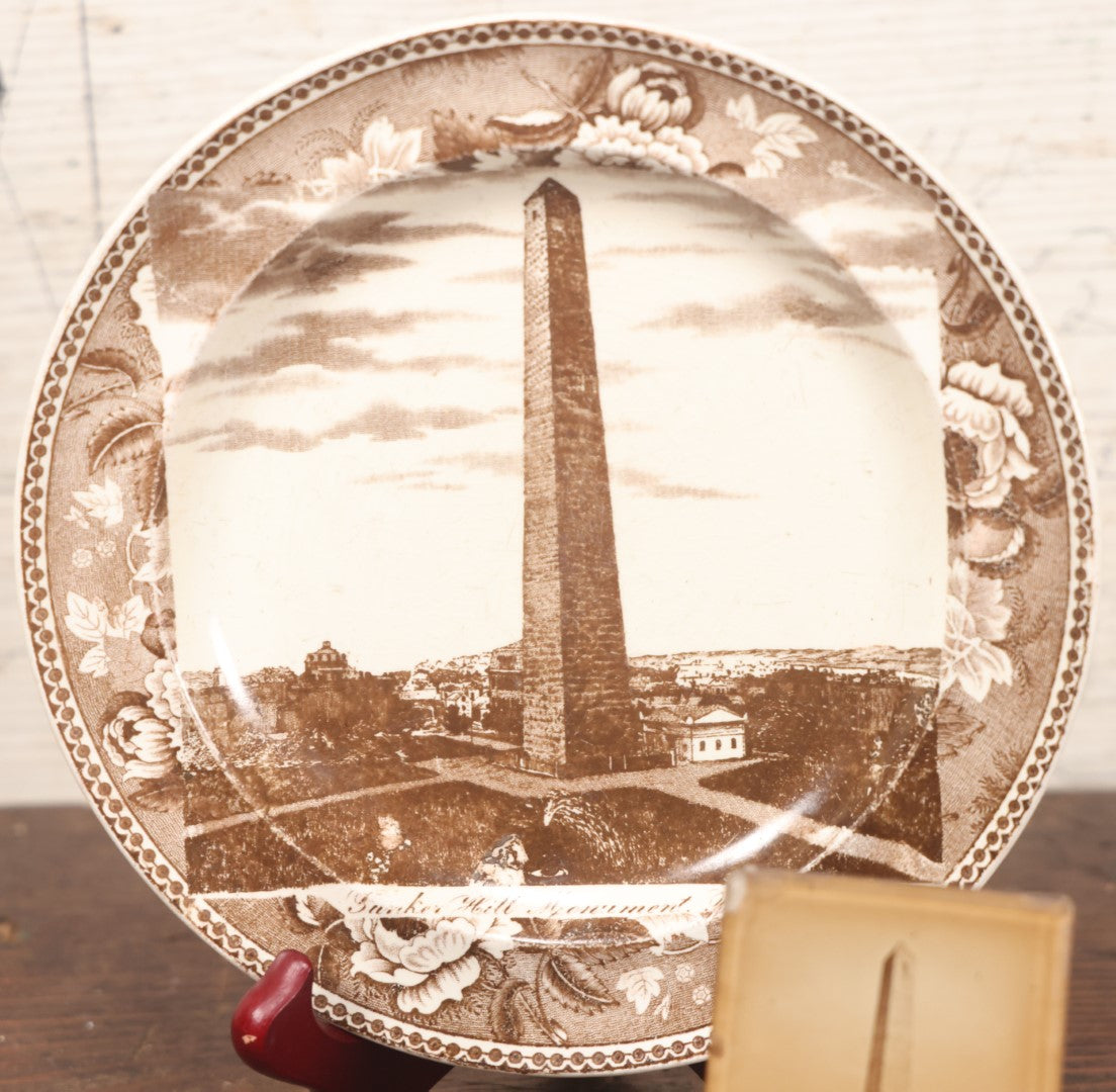 Lot 048 - Pair Of Antique Bunker Hill Monument, Boston, Massachusetts Souvenir Collectibles, Including Transferware Plate And Photograph Mounted To Frame