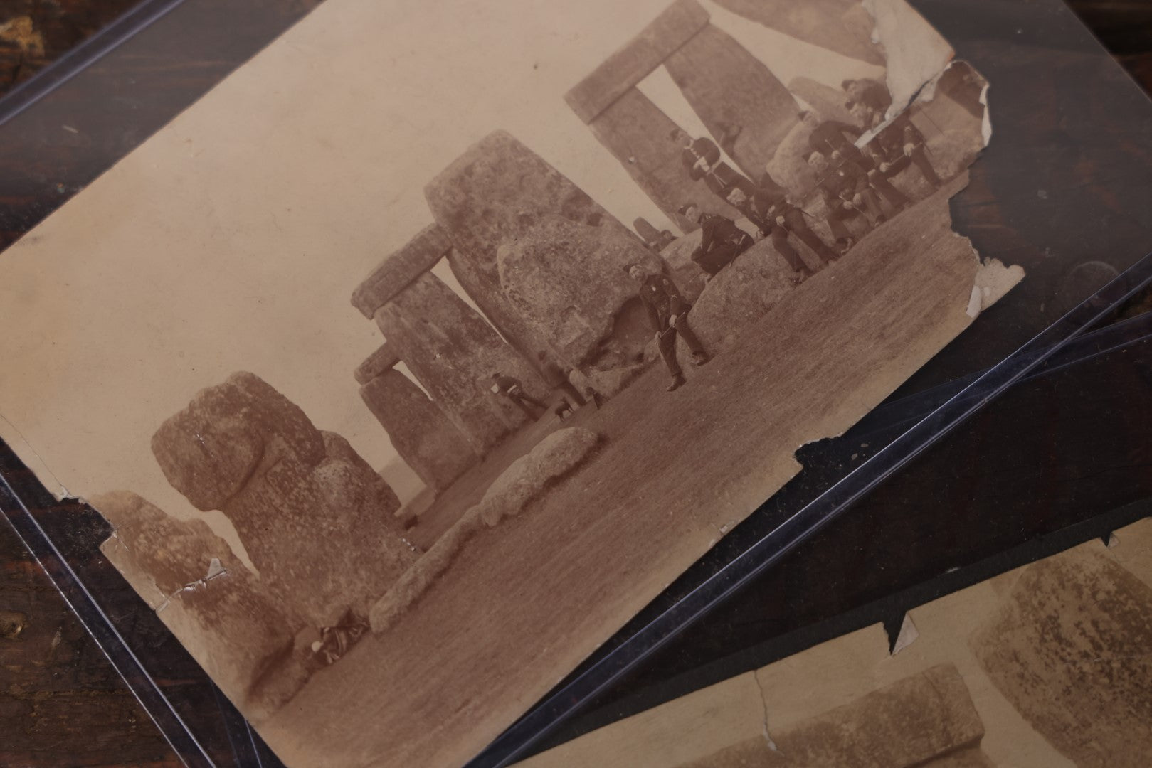 Lot 058 - Pair Of Antique Snap Shot Photos Of Men In Uniform Posing In And Around Stonehenge, England, Note Wear And Tear