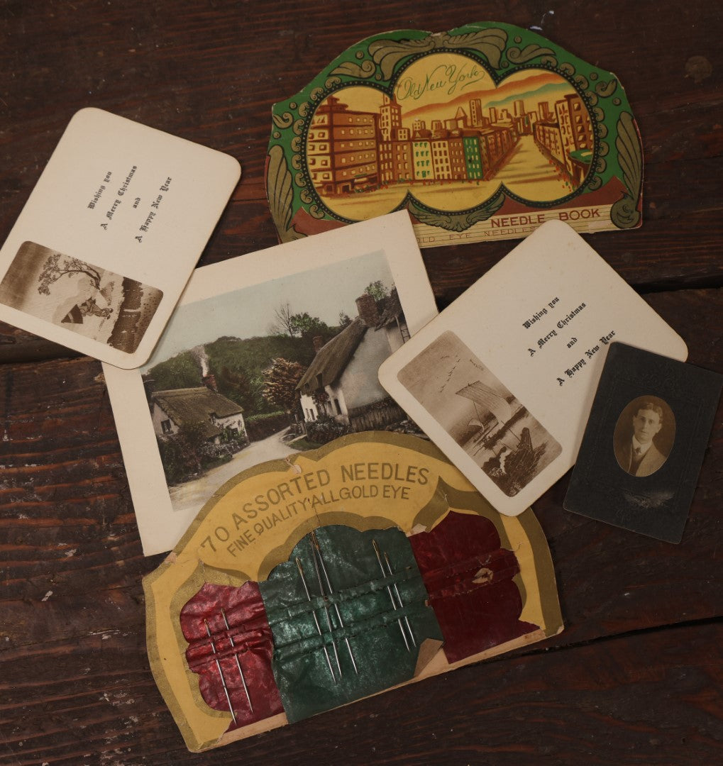 Lot 059 - Grouping Of Five Pieces Of Assorted Ephemera Including New York Needle Book, Christmas Cards, And Small Portrait Photo