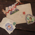 Lot 062 - Grouping Of 3+ Valentines Ephemera With Antique Die Cut Valentines, Including Mechanical Cupid On Seesaw Valentine, And Embossed Envelope