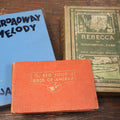 Lot 080 - Grouping Of Three Antique And Vintage Books Including The Broadway Melody, The Red Book Of Birds Of America, And Rebecca Of Sunnybrook Farm