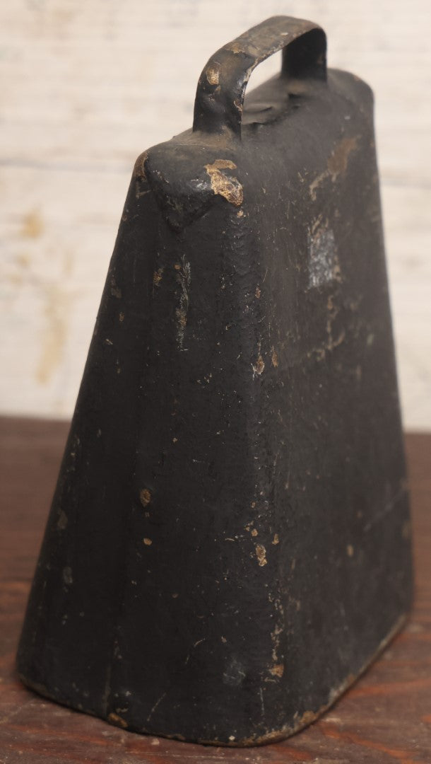 Lot 089 - Vintage Metal Cow Bell In Black Paint