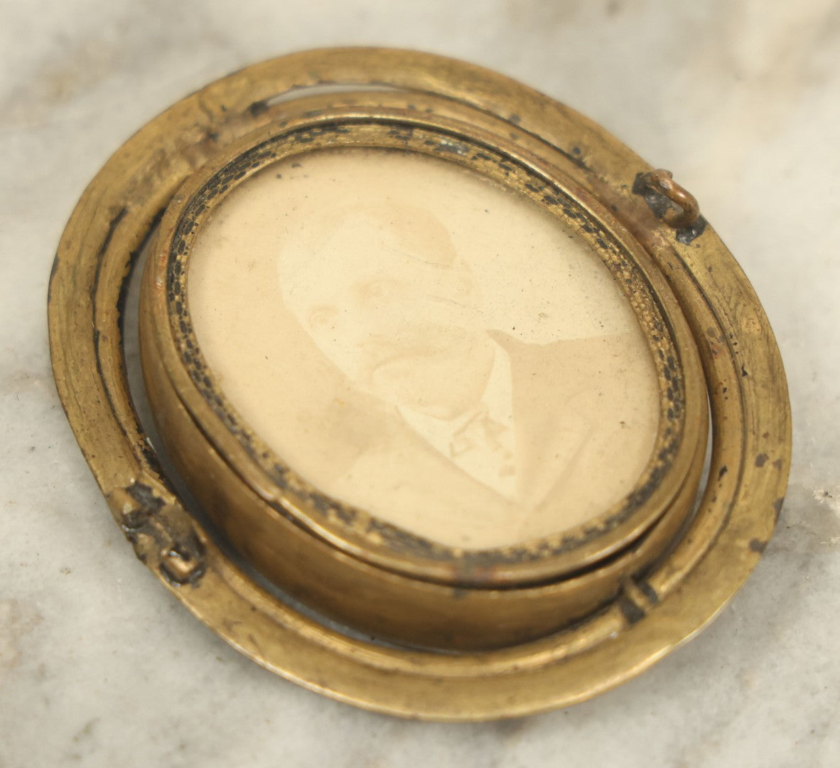 Lot 011 - Antique Brass Swivel Photo Brooch With Tintype And C.D.V. Of Man, Missing Pin, Various Wear