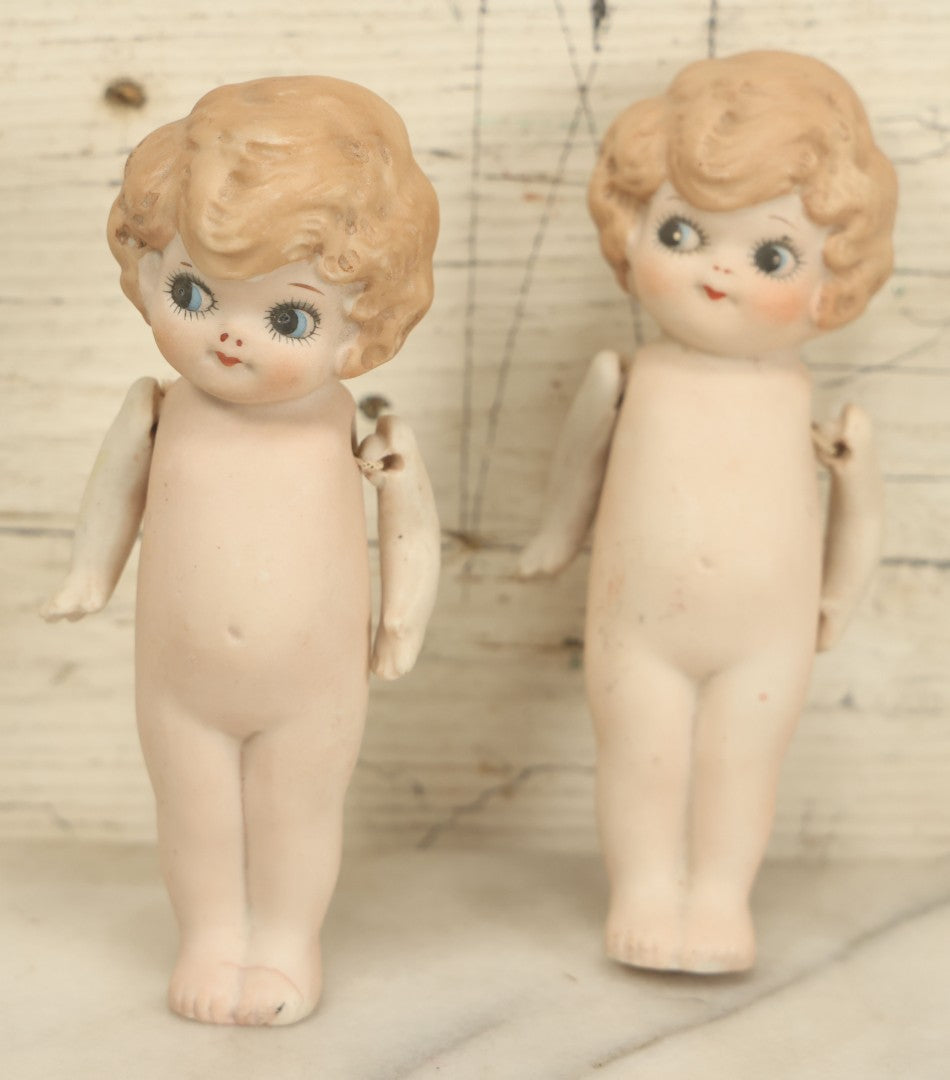 Lot 024 - Pair Of Vintage Bisque Kewpie-Like Flapper Girl Jointed Dolls, Made In Japan