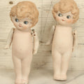 Lot 024 - Pair Of Vintage Bisque Kewpie-Like Flapper Girl Jointed Dolls, Made In Japan