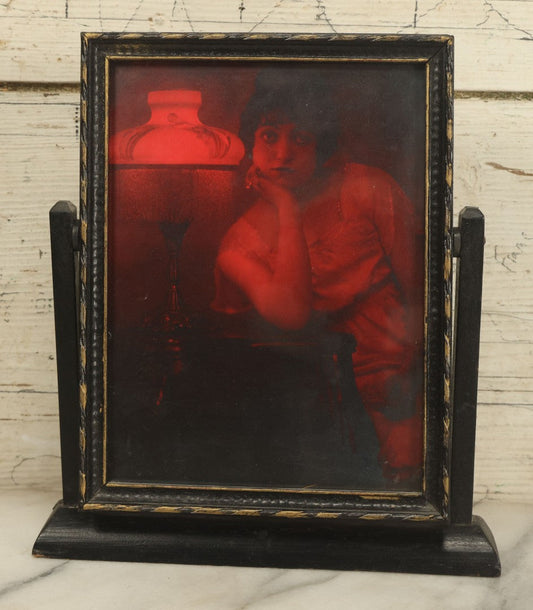 Lot 033 - Vintage Red Tinted Monochromatic Alluring Woman Photograph In Swivel Frame, Circa 1930s