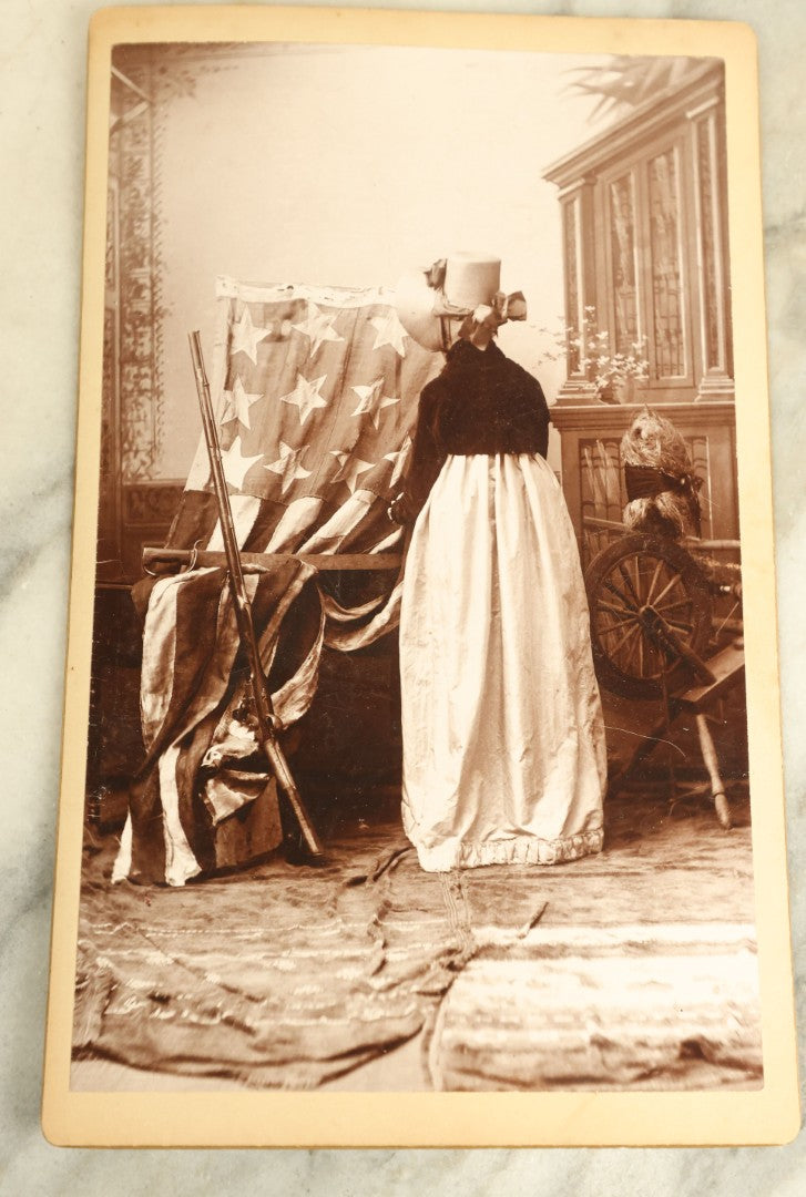 Lot 070 - Pair Of Large Size Antique Cabinet Card Photographs Of An Elderly Woman Posing With A Large Hand Sewn American Flag, Rifle, Possible American Revolution Connection Or Centennial, Chamberlain, Photographer, Rhode Island And Massachusetts