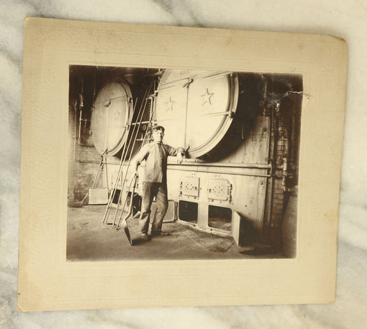 Lot 079 - Antique Boarded Occupational Photograph Of A Man Posing With A Boiler, Forge, With Info On Verso, Near Milford, Massachusetts, Circa 1899 