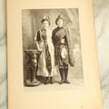 Lot 082 - Antique Boarded Photograph Of Two Young Women In Costume Standing Beside A Griffin Pedestal, Circa 1905