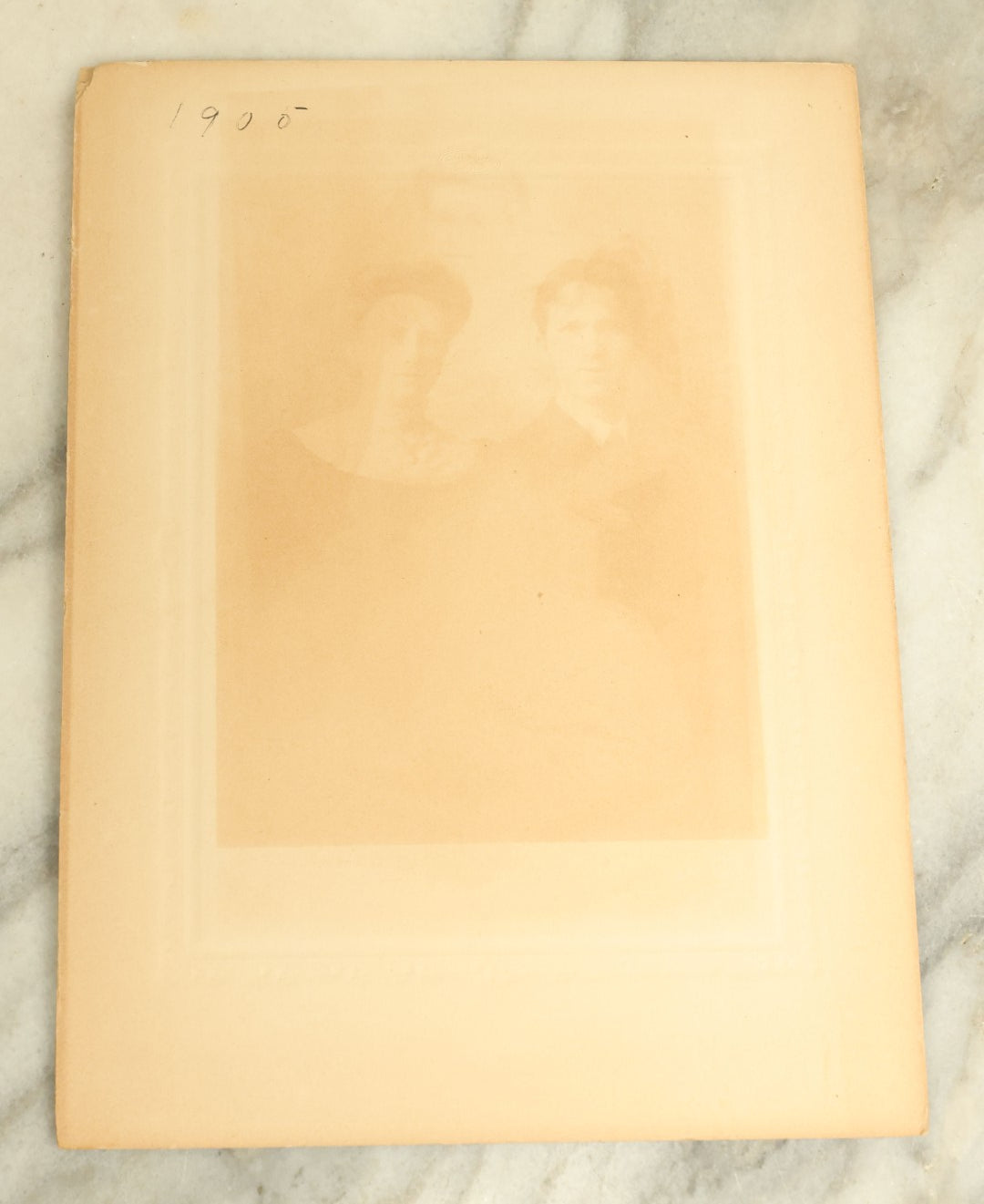 Lot 082 - Antique Boarded Photograph Of Two Young Women In Costume Standing Beside A Griffin Pedestal, Circa 1905