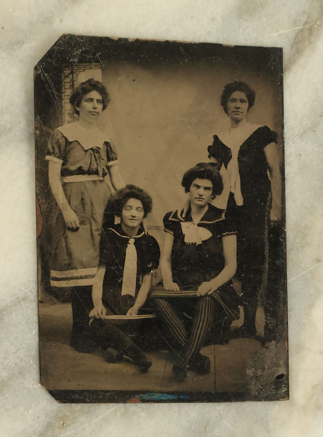 Lot 096 - Single Antique Tintype Photograph Of A Group Of Four Young Women In Their Beachwear, Striped Stockings, Swimsuits