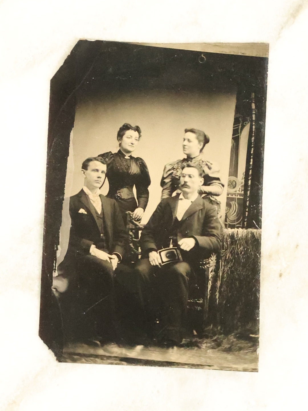 Lot 100 - Grouping Of Nine Antique Tintype Photographs, Mostly Of Groups Of Three Women, With Extravagant Dress