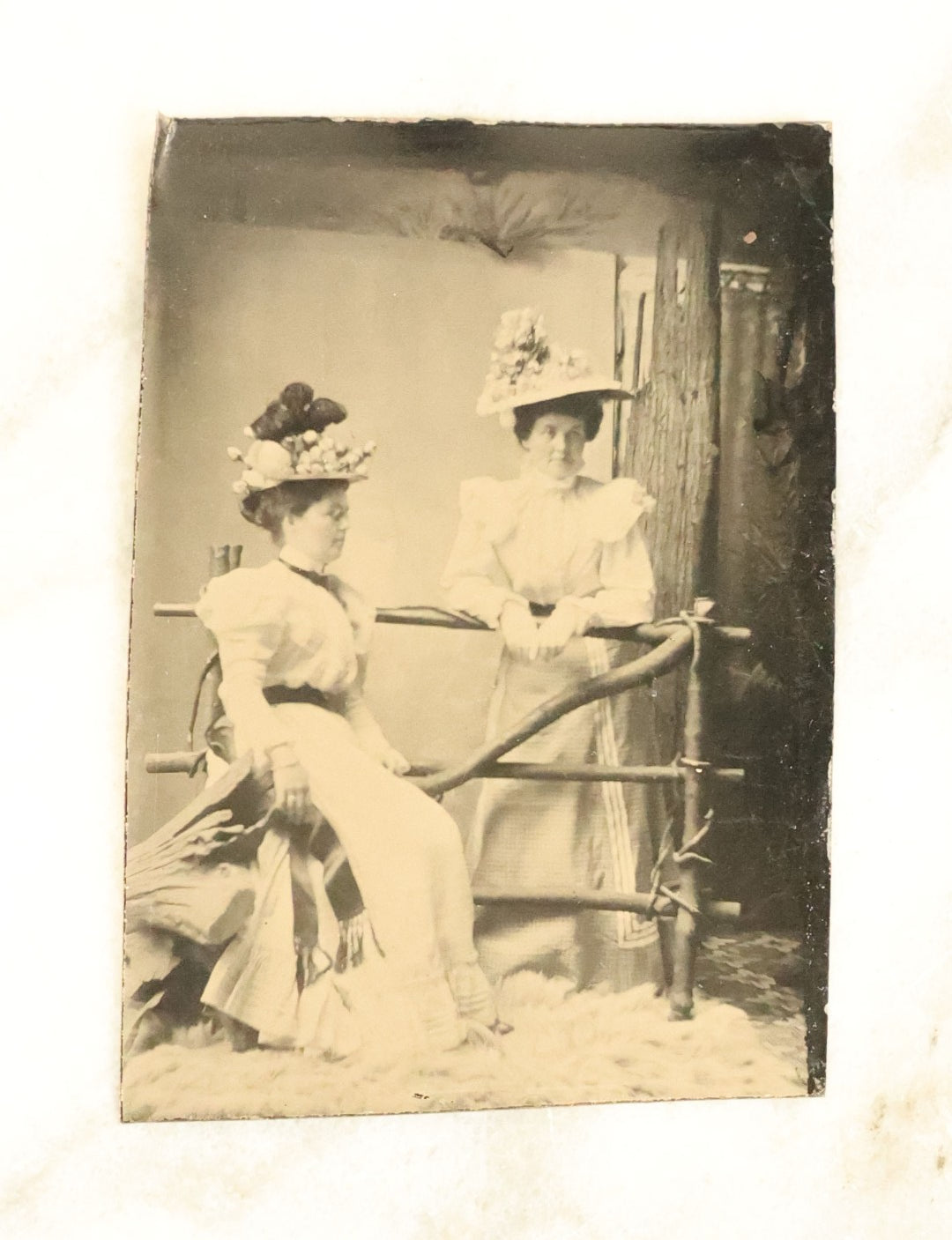 Lot 100 - Grouping Of Nine Antique Tintype Photographs, Mostly Of Groups Of Three Women, With Extravagant Dress