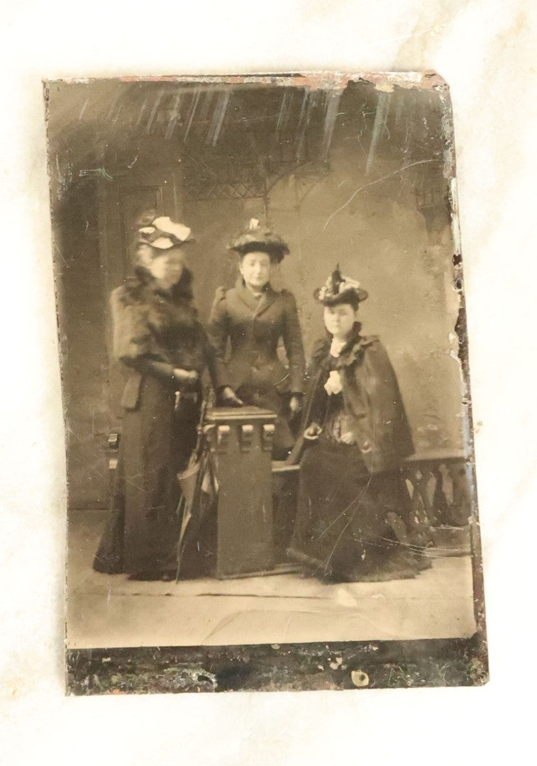 Lot 100 - Grouping Of Nine Antique Tintype Photographs, Mostly Of Groups Of Three Women, With Extravagant Dress