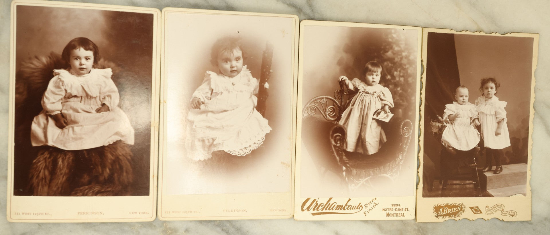 Lot 104 - Grouping Of Four Antique Cabinet Card Photographs Of Young Children, Including Picture-In-Picture P.I.P. Of Child Holding A Cabinet Card Of Another Child