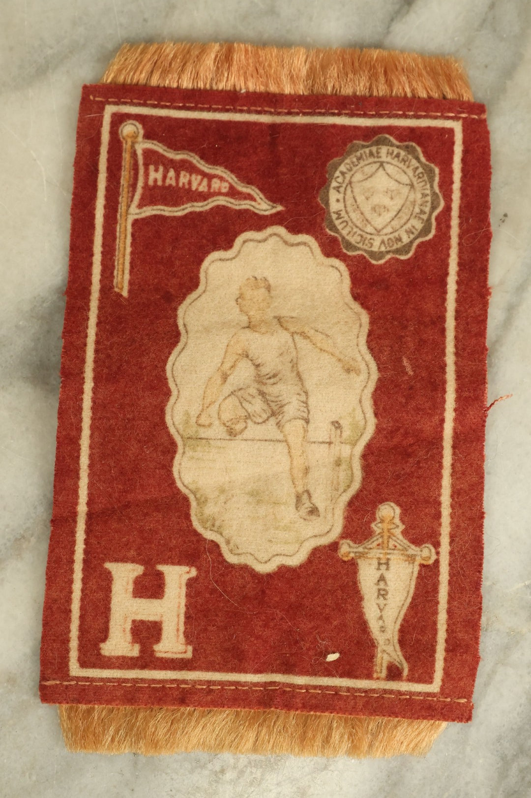 Lot 106 - Antique Small Size Harvard University Tobacco Felt Flag With Track And Field Athlete