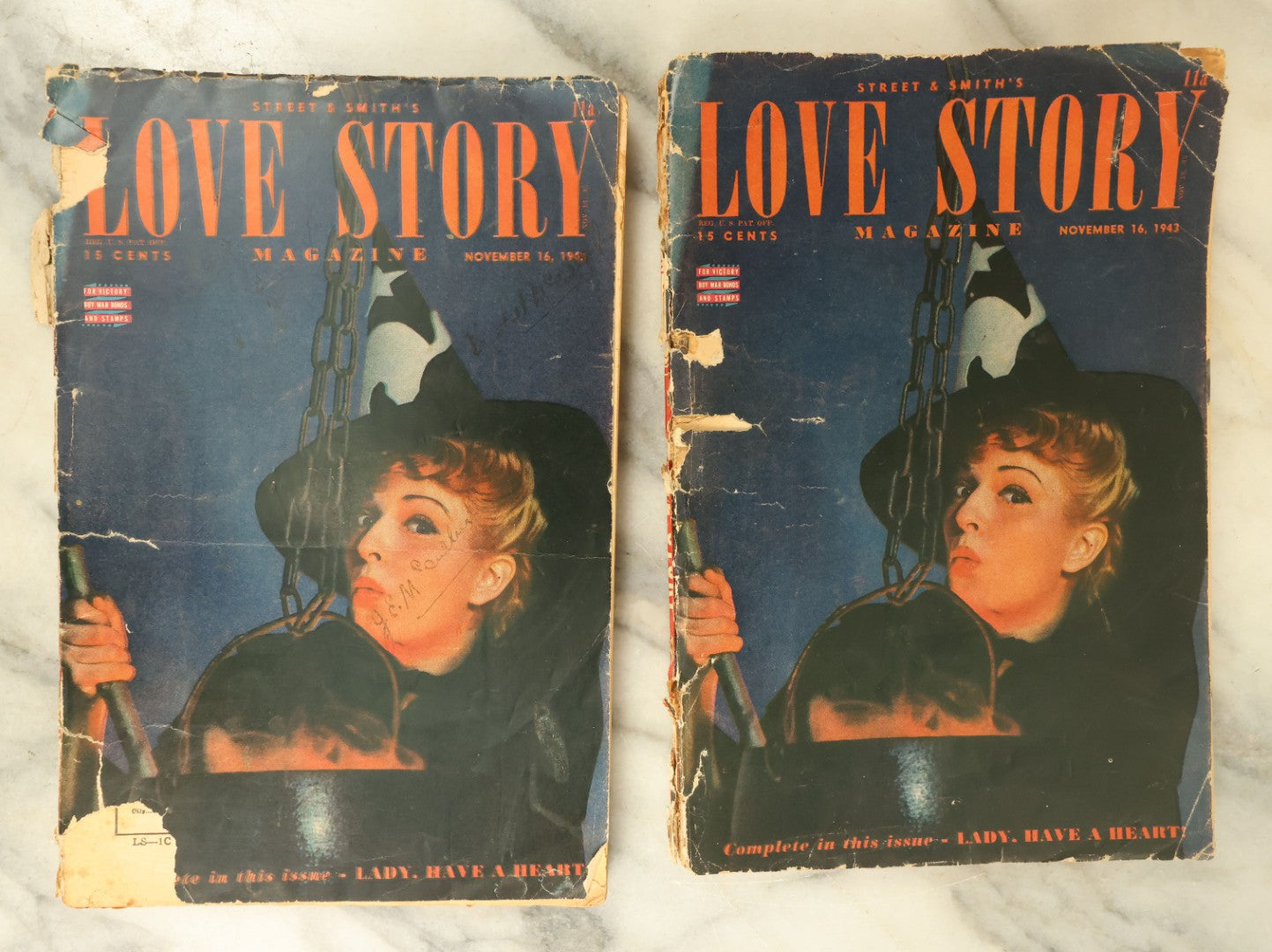 Lot 111 - Pair Of Vintage Halloween Love Story Magazines With Witch, Cauldron On Cover, November 16, 1943, Fair Condition