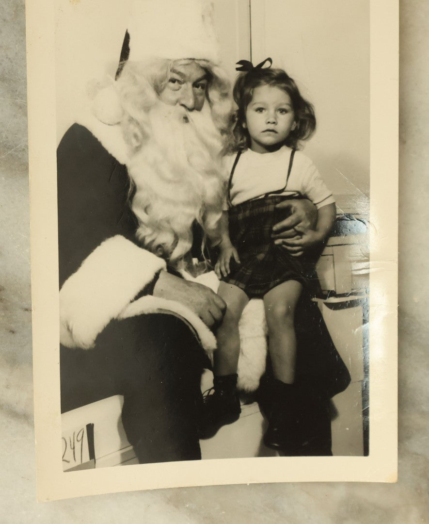 Lot 120 - Pair Of Vintage Christmas Photos Of Children With Santa Claus, Including Folded Photo Of Baby Crying, Terrified Of Santa