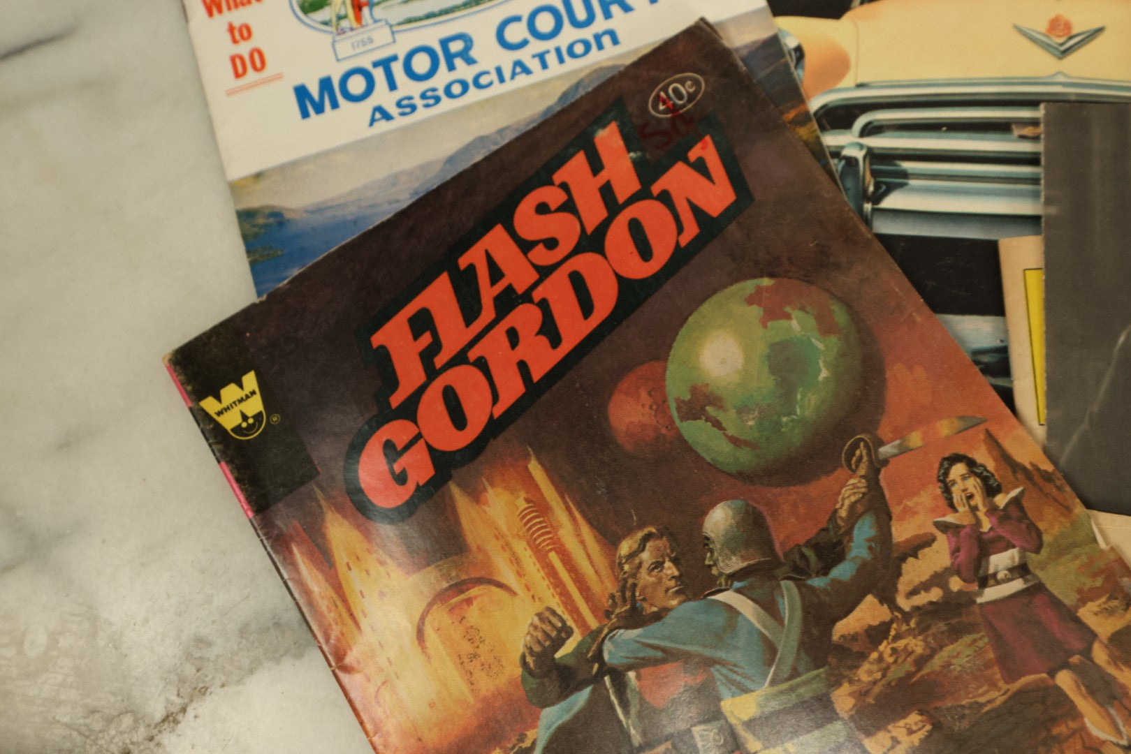 Lot 138 - Grouping Of Miscellaneous Mixed And Vintage Ephemera Including Kennedy Items, Vagabond Magazine, Elvis Presley Coins, Flash Gordon Comic, And More