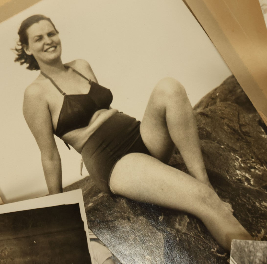 Lot 139 - Grouping Of 20+ Vintage Risque, Sexy Snap Shot Photos Of A Woman In Her Swimsuit, Posing By The Beach, Various Sizes, Circa 1950s