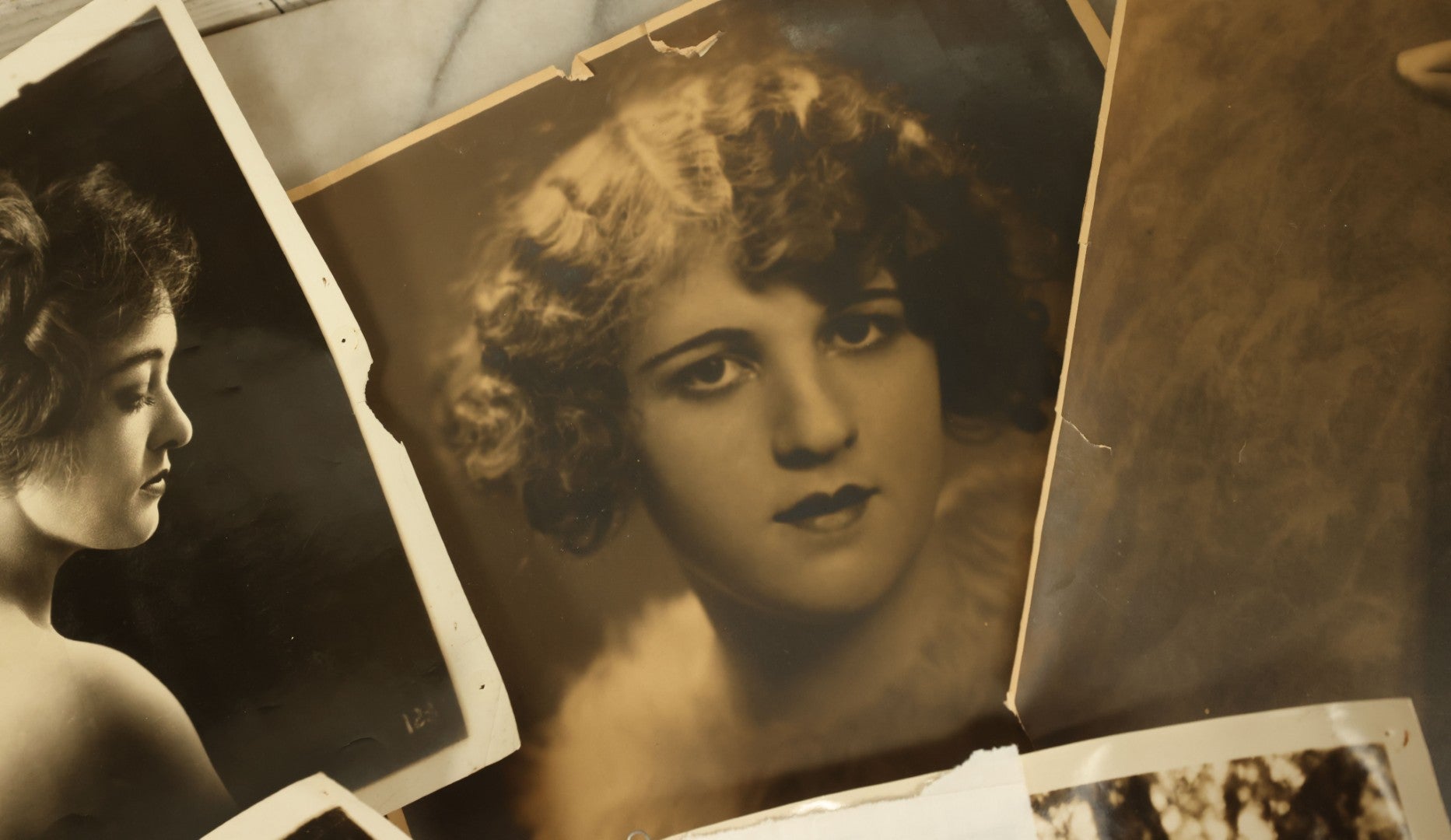 Lot 143 - Grouping Of Six Antique Headshot And Pinup Photos Of Actresses, Dancers, Including Marion Davies, Virginia Pearson, Others