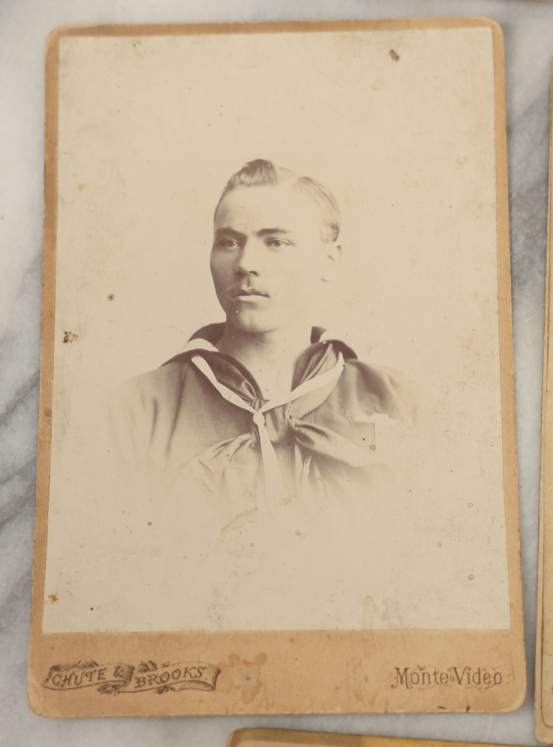 Lot 002 - Grouping Of Sixteen Antique Cabinet Card Photographs Of United States Navy Sailors Of The U.S.s Newark, Circa 1880, Photos Taken In Montevideo, Uruguay, South America